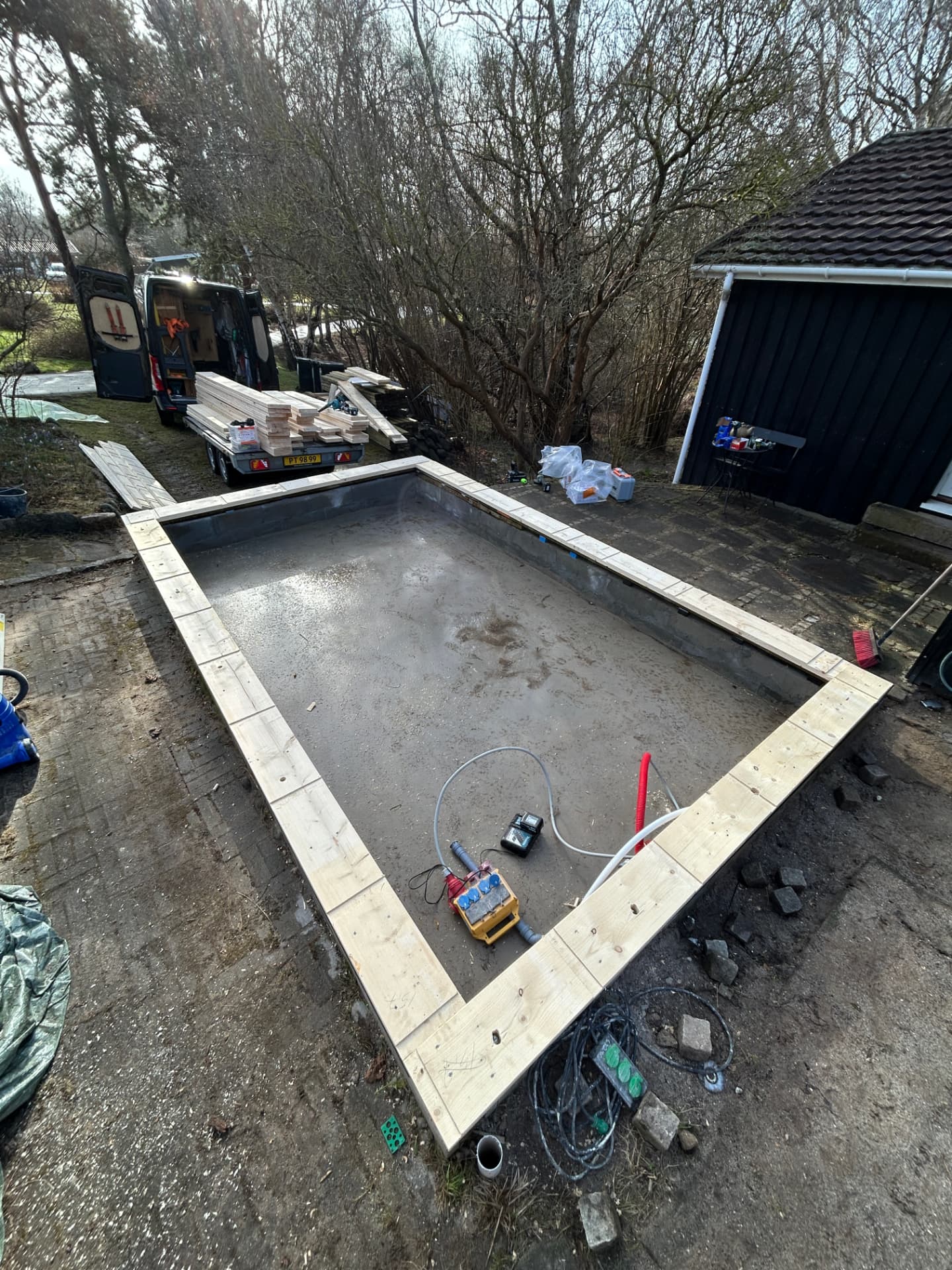 Bottom plate installed on the annex's foundation, checked to be square and level