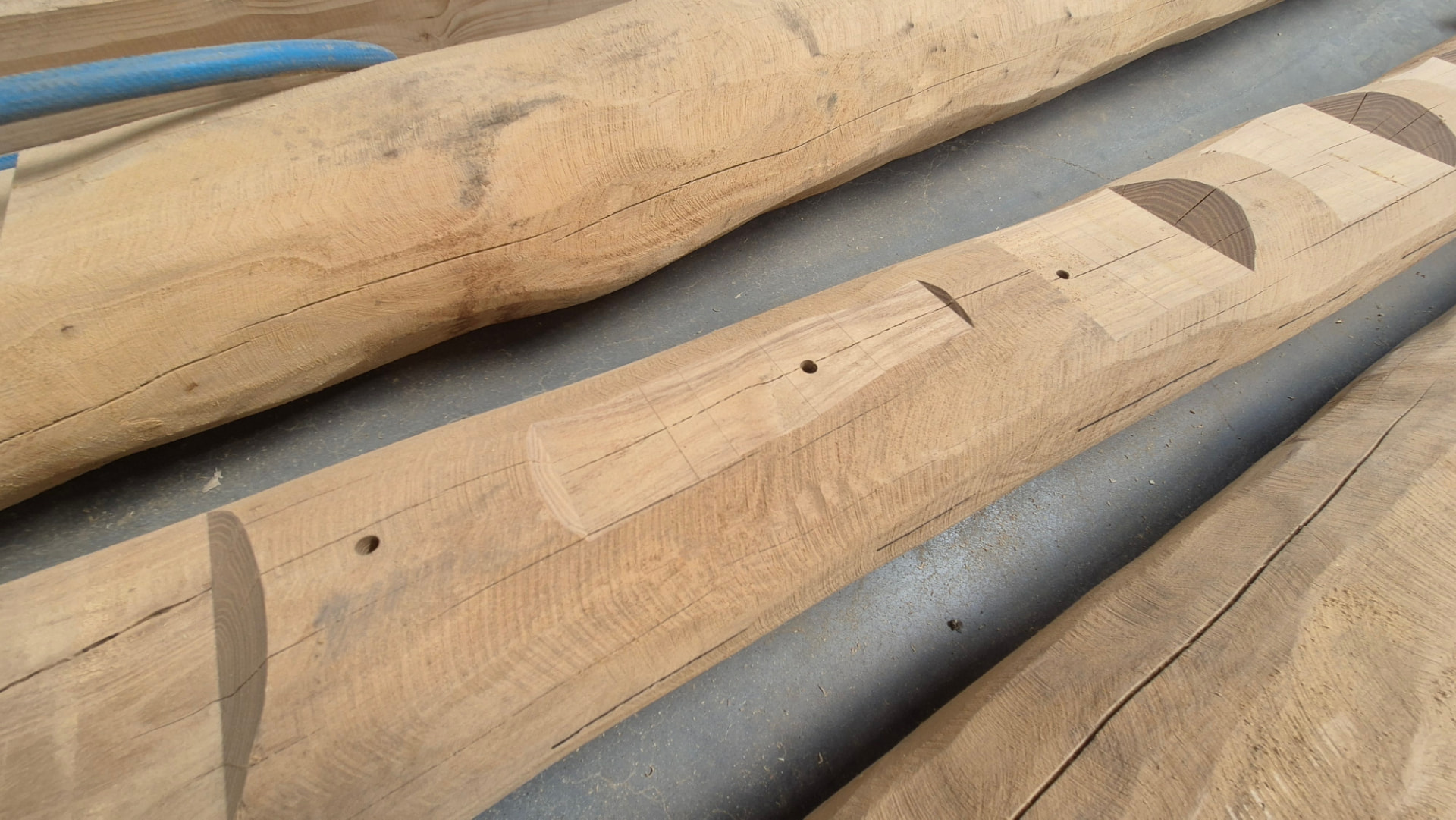Close-up of milling and drilling in a robinia post